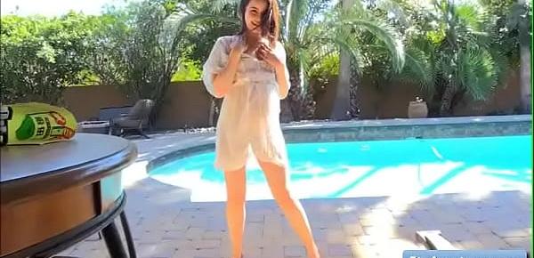  Young brunette amateur Kylie gets naughty by the pool and reveal her natural perky boobs and nipples